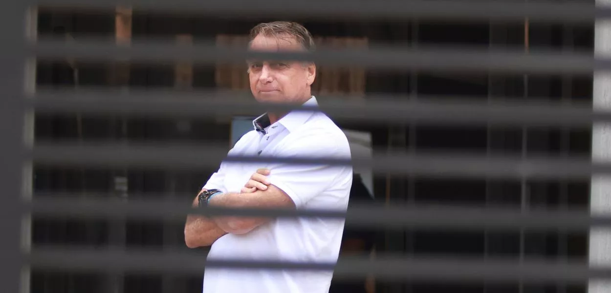Brazil's former President Jair Bolsonaro, photographed here in September 2025 as he stands at the entrance of his home in Brasilia while he is under house arrest. (Photo: Luis Nova/AP)