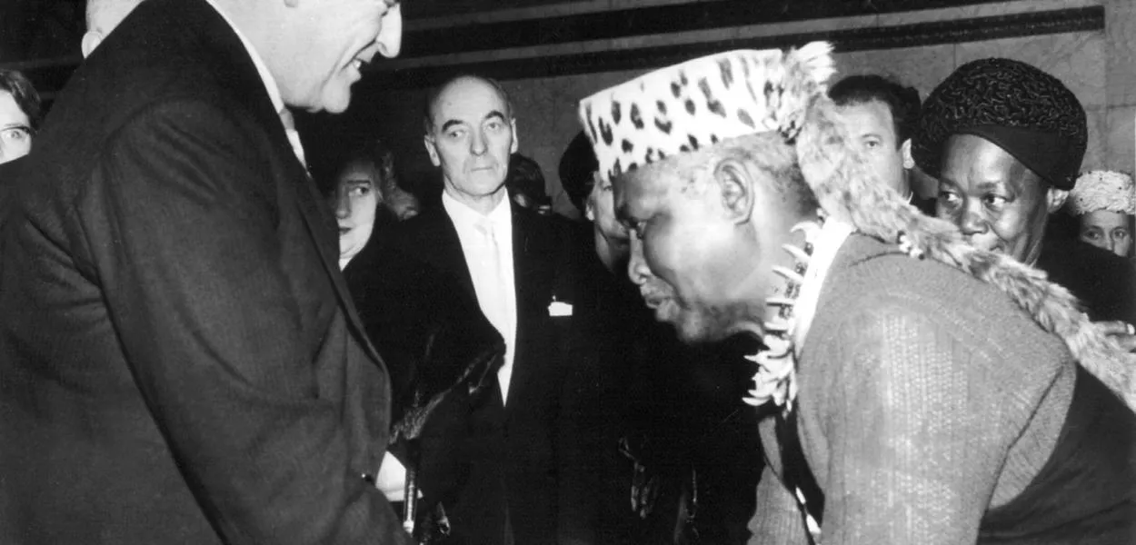 The 1960 Nobel Peace Prize winner, South African politician Albert John Lutuli, accepts congratulations from Norwegian King Olav V after the award ceremony. Lutuli received the award in recognition of his efforts to achieve equal rights for people of colour in South Africa through non-violent means. (Photo: DB NTB)