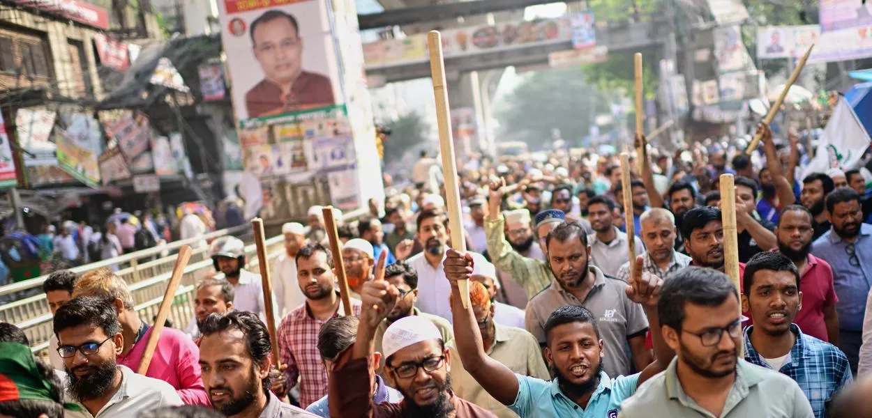 Activists of Bangladesh's Jamaat-e-Islami party stage a protest rally against a nationwide "lockdown" called by ousted Prime Minister Sheikh Hasina and her former ruling Awami League party, in Dhaka, Bangladesh, Thursday, Nov. 13, 2025. (Photo: AP Photo/Mahmud Hossain Opu)