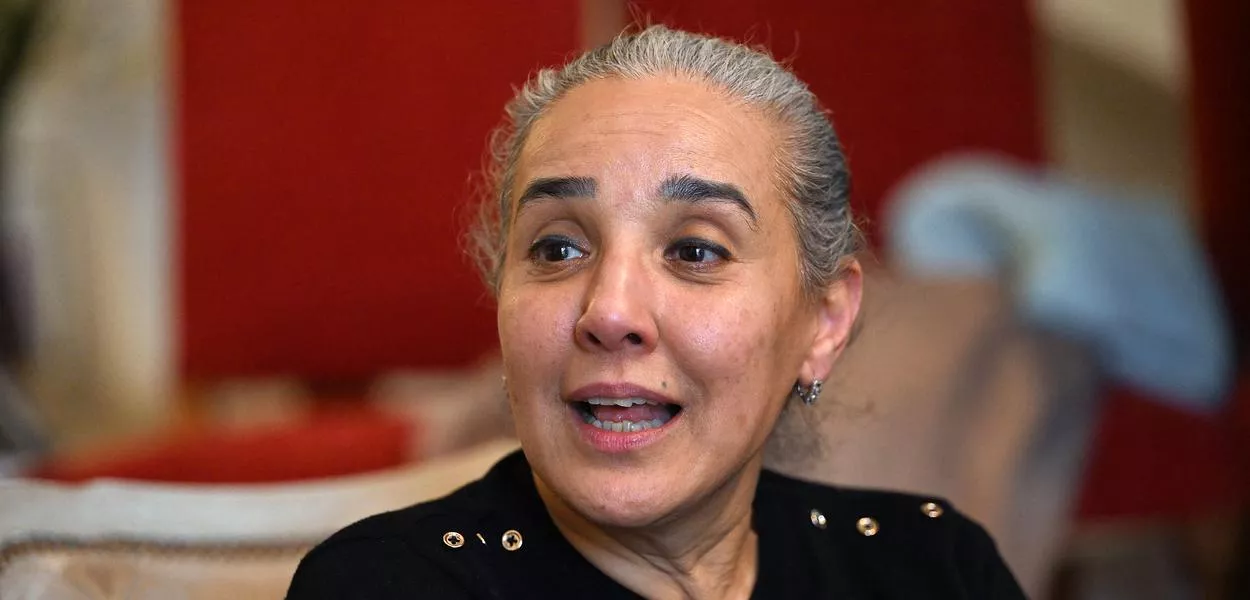 Tunisian lawyer and writer Sonia Dahmani speaks at home in Tunis on November 27, 2025 after her conditional release from prison. (Photo: Fethi Belaid/AFP)