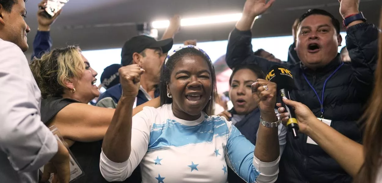 Supporters of presidential candidate Nasry Asfura, of the National Party, celebrate preliminary results during general election in Tegucigalpa, Honduras, Sunday, Nov. 30, 2025. (AP Photo/Emmanuel Andres) (Photo: Emmanuel Andres)