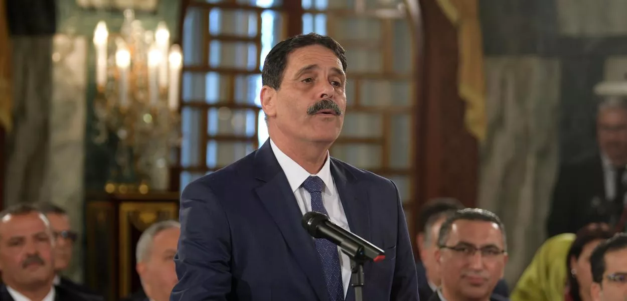 Ayachi Hammami when taking the oath of office as minister of human rights and relations in 2020. He was arrested in the latest of a string of arrests and verdicts against critics of the regime. (Photo: Fethi Belaid/Pool via AP)