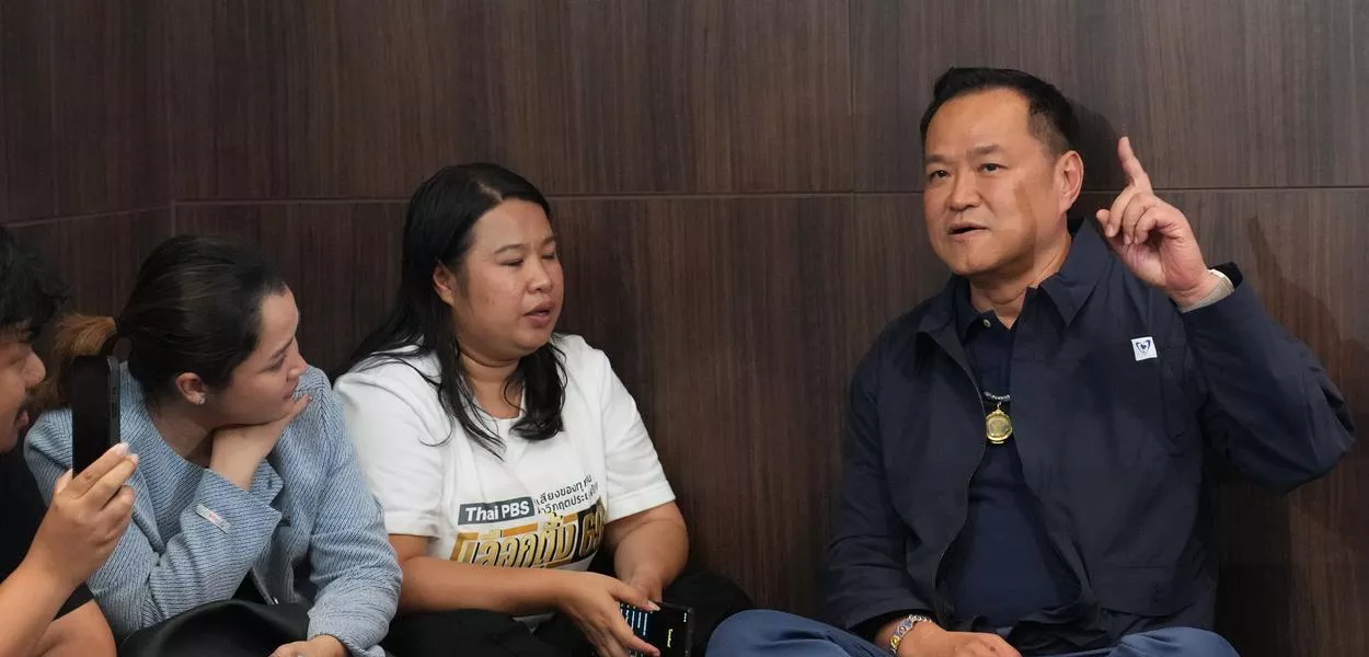 Thailand's Prime Minister and leader of Bhumjaithai Party Anutin Charnvirakul speaks with journalists at the party headquarters while waiting for the results in the general election on February 8, 2026. (Photo: Sakchai Lalit/AP)