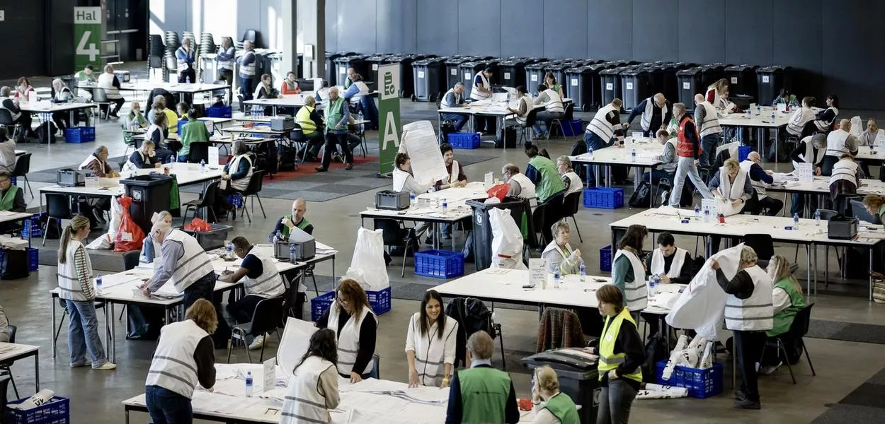 Election workers count ballots at a counting station set up in the Rotterdam Ahoy complex in Rotterdam on March 19, 2026, one day after the Dutch municipal elections. (Photo: Robin van Lonkhuijsen/ANP/AFP)