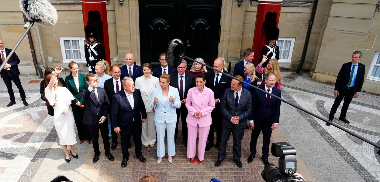Mette Frederiksen, centre, in blue, speaks to the media after presenting a new government to the king at Amalienborg Castle in Copenhagen, Wednesday, June 3, 2026. (Photo: Mads Claus Rasmussen/Ritzau Scanpix via AP)