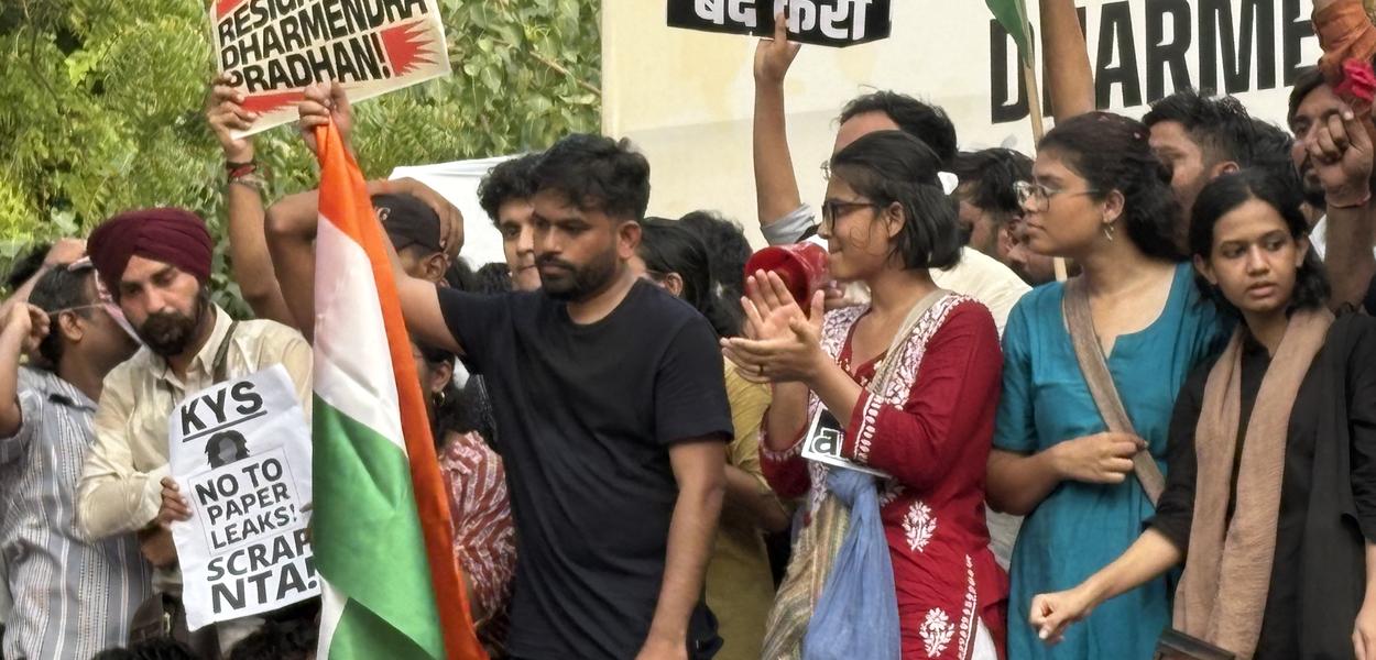 The founder of the Cockroach Janta Party, Abhijeet Dipke (centre), during a protest rally in New Delhi on June 20, 2026.
